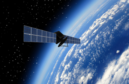 A satellite orbiting Earth. 