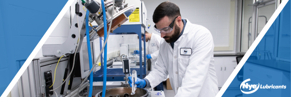 A Nye engineer validates lubricants using advanced test equipment in their Vacuum Aerospace and Semiconductor Test Laboratory. 