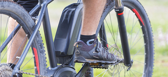 A man riding an e-bike.