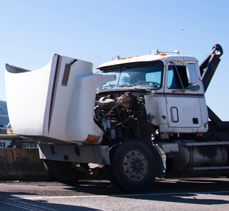 A heavy duty truck with an open hood.