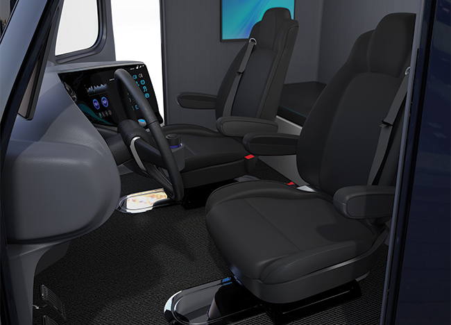 The interior seating area of a heavy duty truck. 